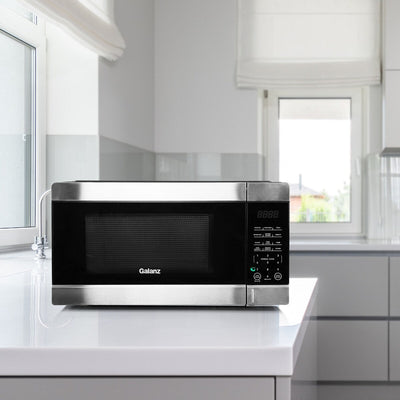 Four à micro-ondes de comptoir noir de 0,9 pi³ et 900 W avec cuisson express à une touche