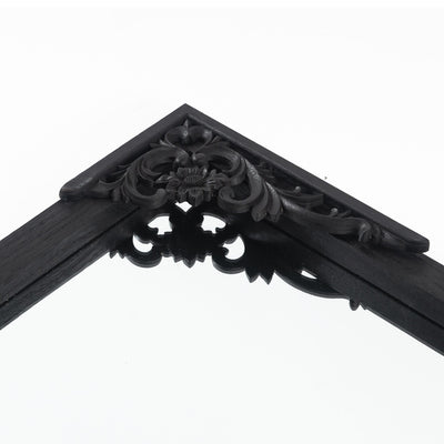 Miroir de sol sculpté en bois massif de forme arquée sur toute la longueur