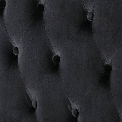 Canapé à oreilles hautes capitonné en velours noir