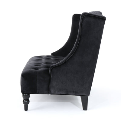 Canapé à oreilles hautes capitonné en velours noir