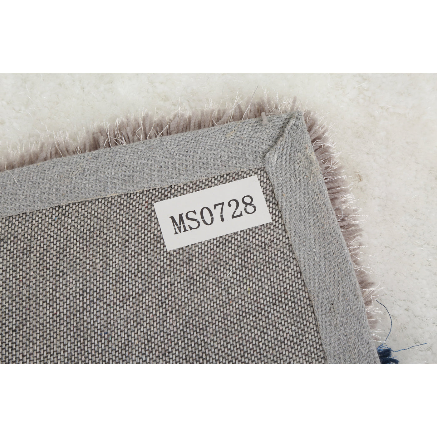 Tapis à poils longs Mateos au design abstrait