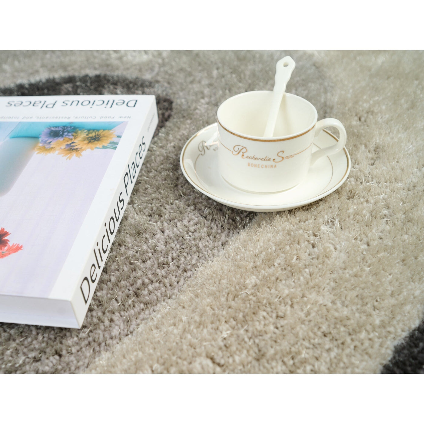 Tapis à poils longs Mateos au design abstrait