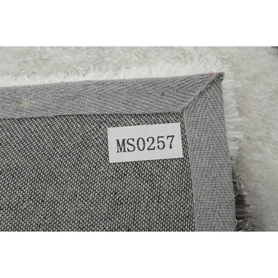 Tapis à poils longs Mateos au design abstrait