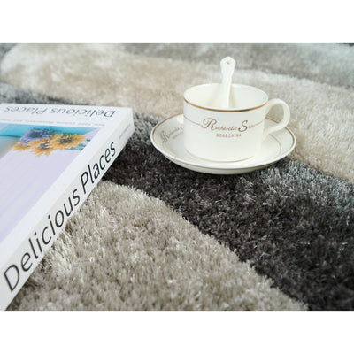 Tapis à poils longs Mateos au design abstrait